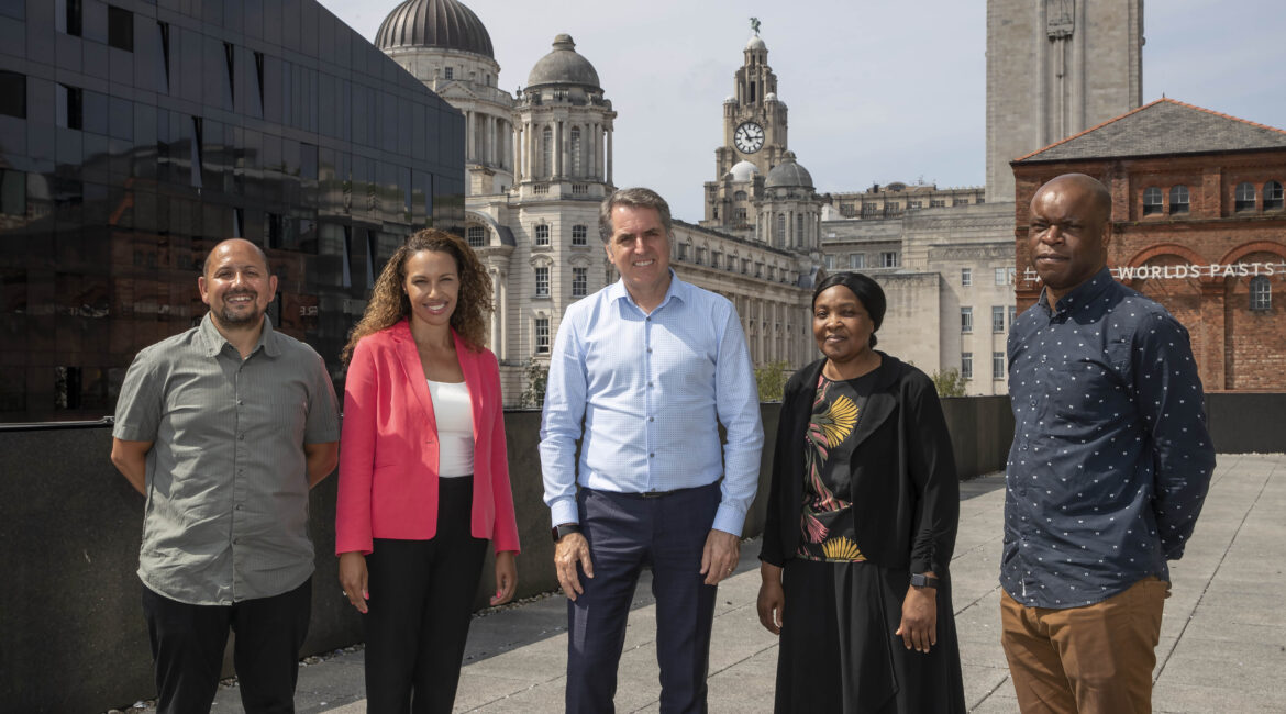 Metro Mayor Steve Rotheram (centre) pictured with (l to r) Earl Jenkins, Chair of Kingsley United FC, Lorna Rogers, Assistant Director, Mayoral Programme Delivery at the Liverpool City Region Combined Authority, Moni Akinsanya, Equality, Diversity & Inclusion Manager at Liverpool John Moores University, and Emeka Onuora, Race Equality Project Manager at the Liverpool City Region Combined Authority.
